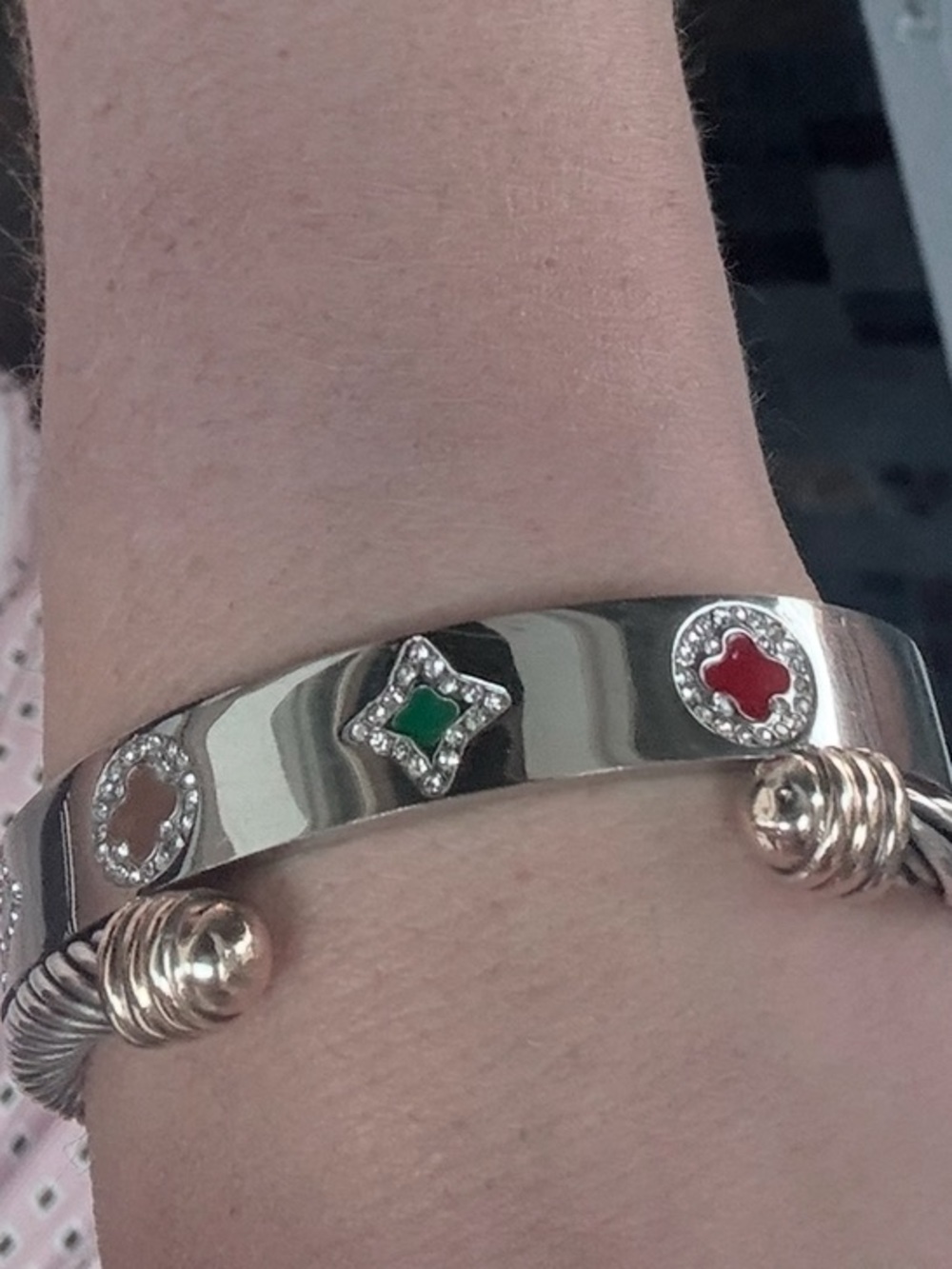 This is a stainless steel, silver-toned bangle bracelet